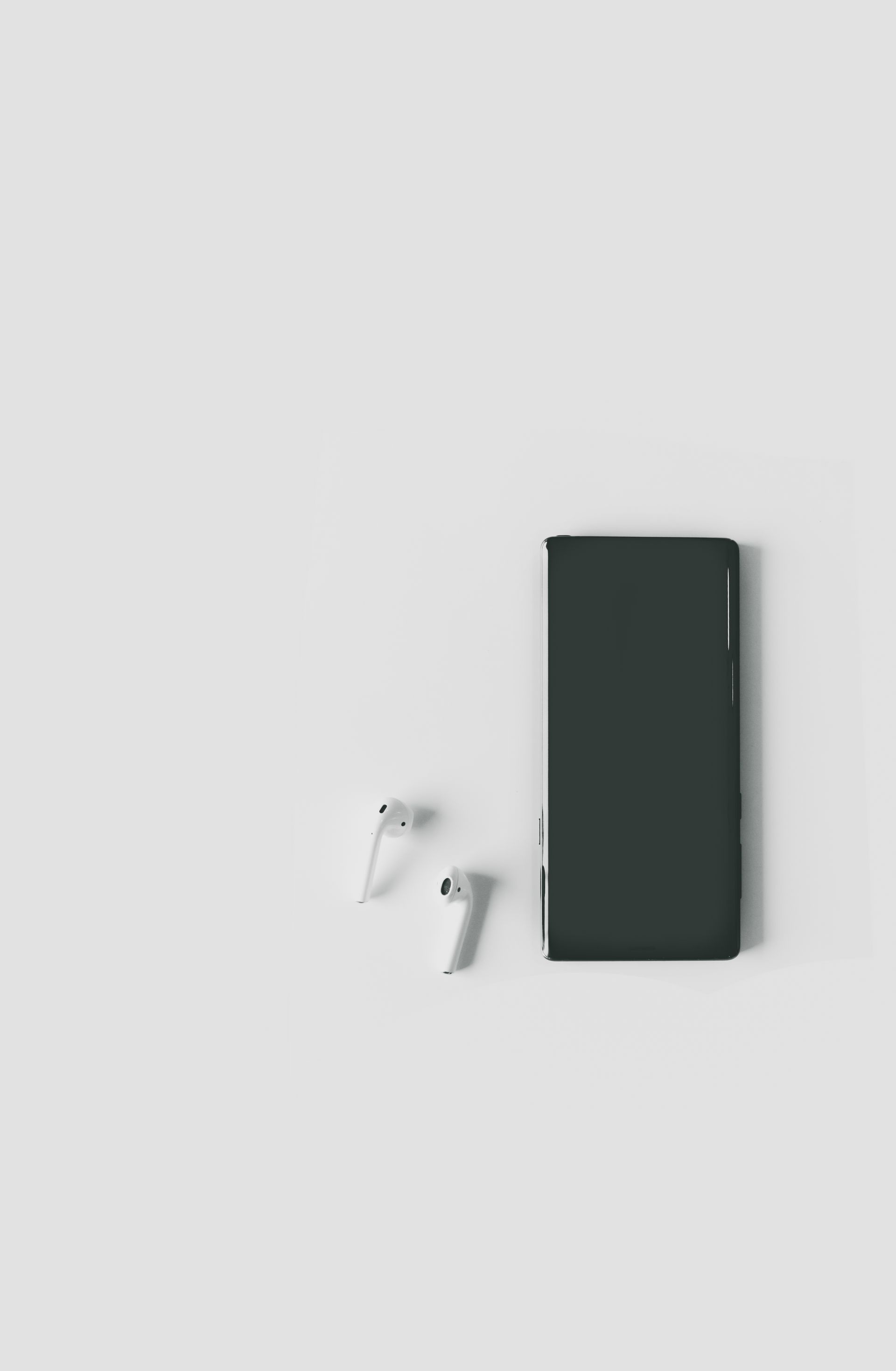 Representative consumer electronics: smartphone and wireless earbuds