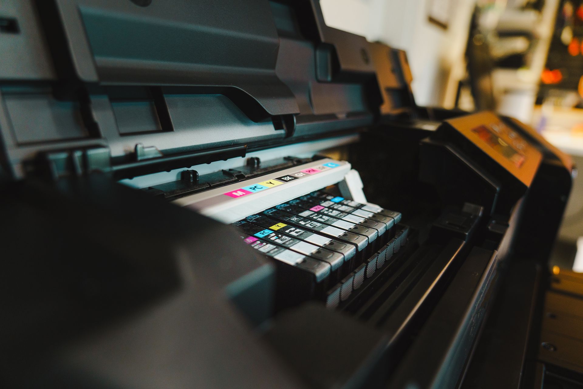 Representative printing consumables: ink cartridges inside an inkjet printer
