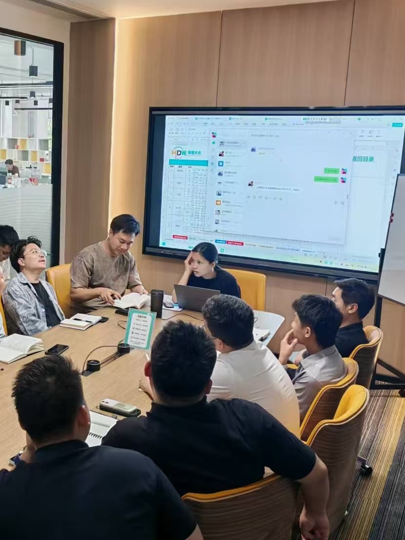 Modern Future operations team reviewing shipment details